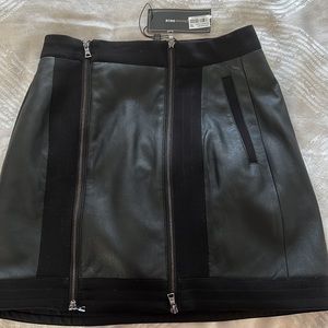 BCBG black leather skirt with zippers.  “Roxy” style
